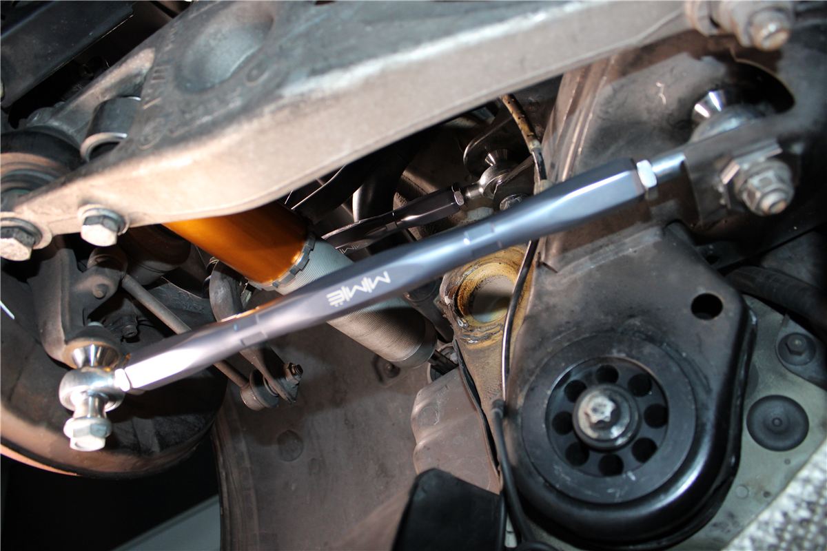 MME Design Concept — Range 1 A Meisterschaft rear control arm fitted to a car on the lift